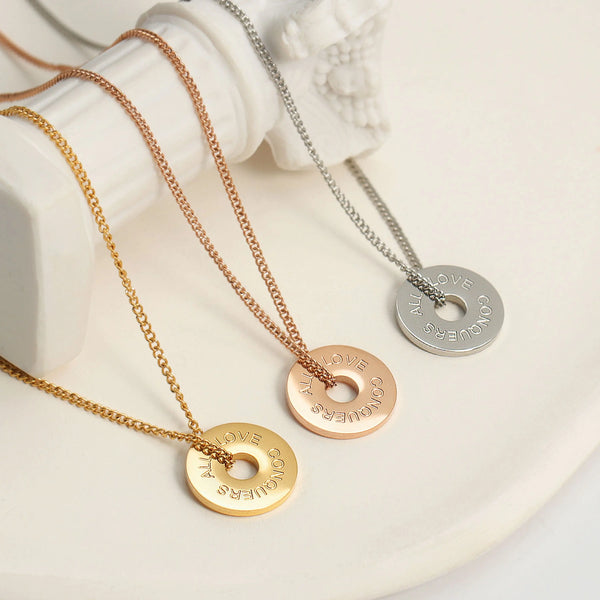 LOVE CONQUERS ALL - Circle Necklace