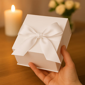 Geschenkverpackung mit Schleife